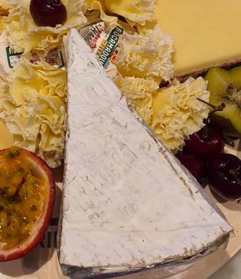 Brie truffé fromage à la coupe